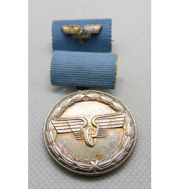 *Médaille de service...