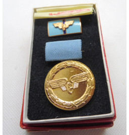 *Médaille de service...